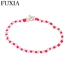 BRACCIALE A NODI ARGENTO E PALLINE