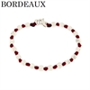 BRACCIALE A NODI ARGENTO E PALLINE